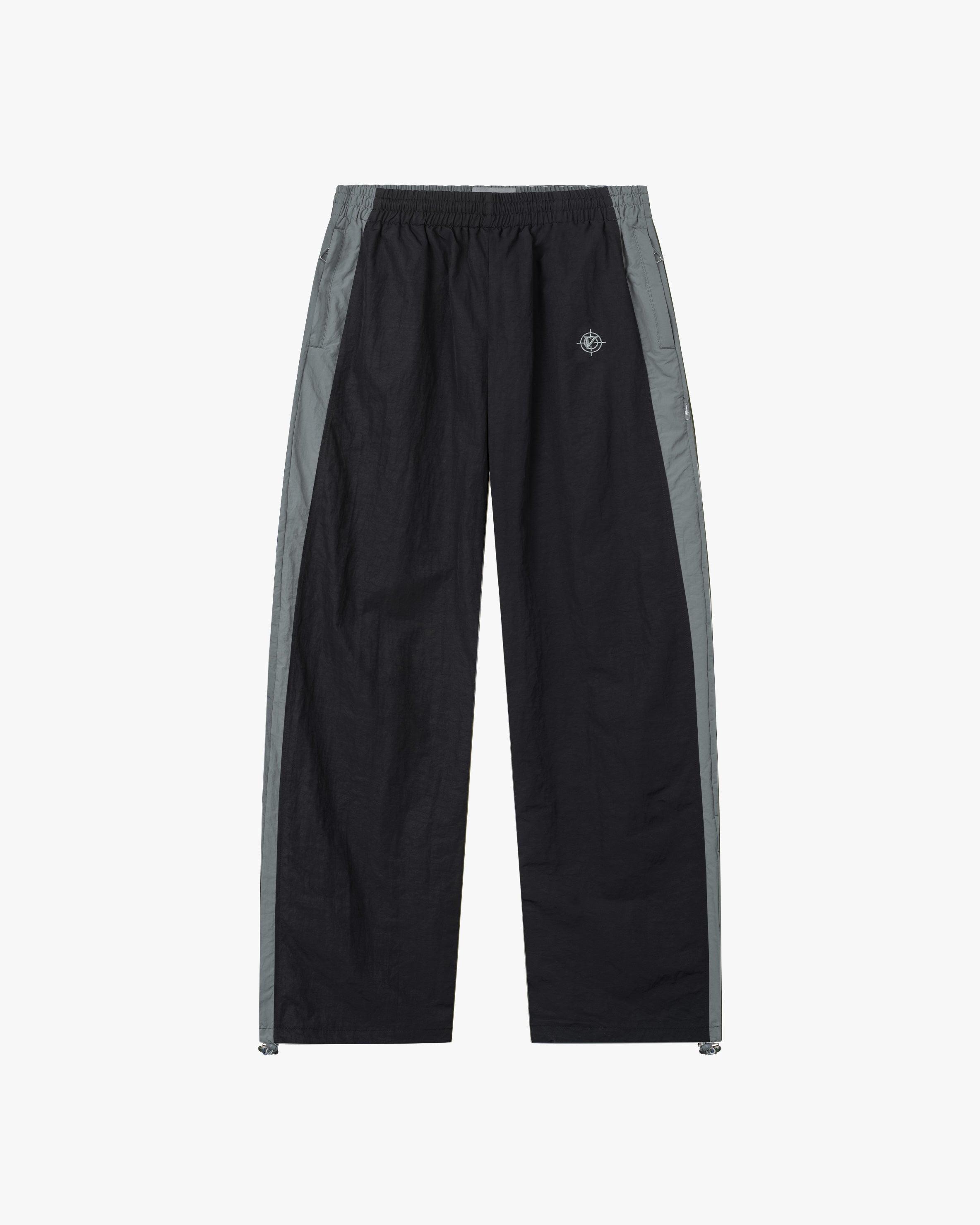 Black and grey track pants on sale